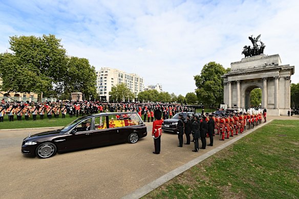 The royal hearse carrying the coffin of Queen Elizabeth II at Wellington Arch.