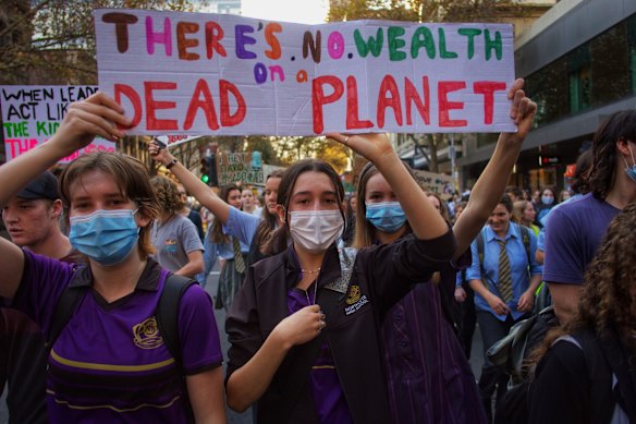 An estimated crowd of five thousand gathered at Treasury Gardens on Friday for Climate Strike, a rally and march organised by School Strike 4 Climate after the recent federal budget announcement. 