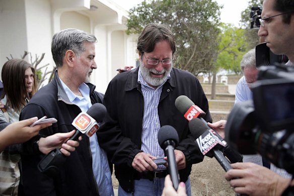 Richard Martinez, center, who says his son Christopher Martinez was killed in Friday night's mass shooting that took place in Isla Vista, California.