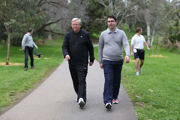 Prime Minister Kevin Rudd walks with adviser Patrick Gorman during an early morning walk in Adelaide.
