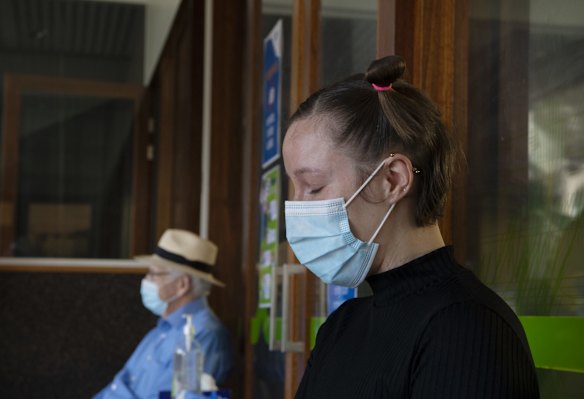 Local people wait to be tested.