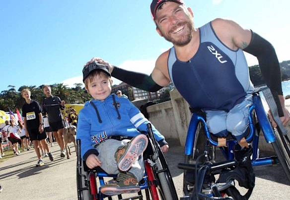 Wheelchair racer Cormac Ryan and Paralympian Kurt Fearnley (R) at the Humpty Dumpty Foundation's Balmoral Burn run.