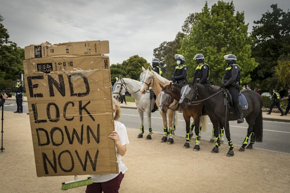 Police clash with protesters at the Shrine.