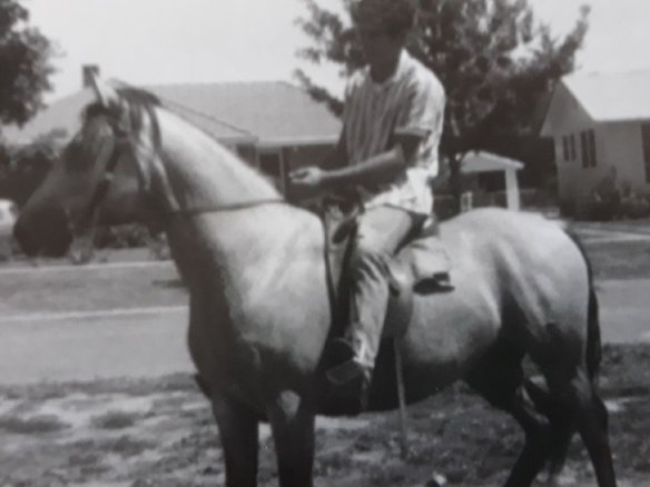 Angelo Costa rides along Warramoo Crescent, Narrabundah, in the early 1960s.