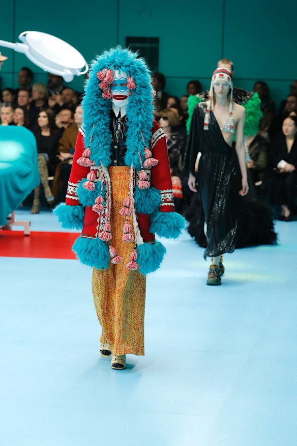A model wears a creation as part of the Gucci women's Fall/Winter 2018-2019 collection, presented during the Milan Fashion Week.