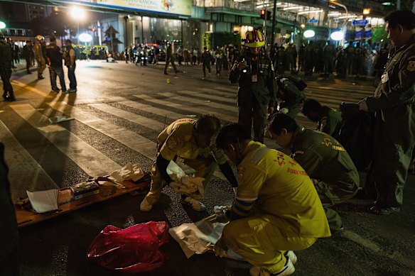Emergency services attend the scene of an explosion on August 17, 2015 in Bangkok, Thailand. 