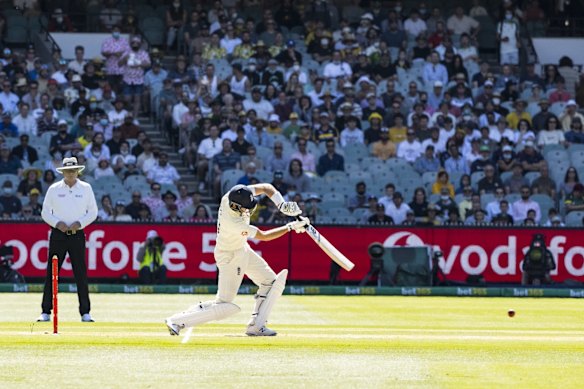 Joe Root drives Mitchell Starc early on day 3