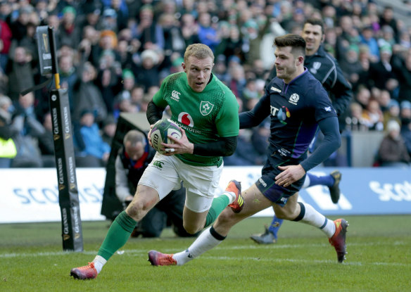 reland's Keith Earls scores their third try during the the Six Nations match.