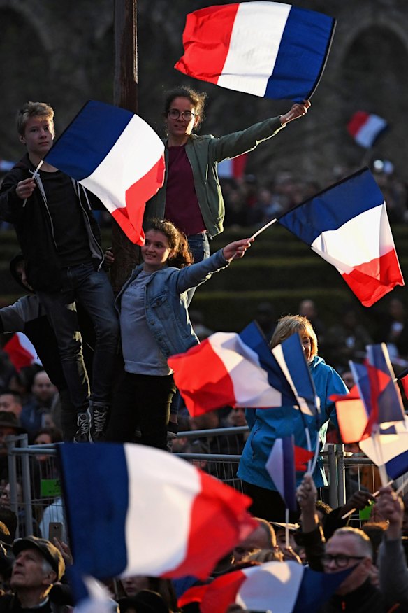 Supporters arrive ahead of Emmanuel Macron's Electoral Evening at The Louvre on May 7, 2017 in Paris, France.?Voters are going to choose their next president after a tightly fought and somewhat unpredictable campaign.? (Photo by Jeff J Mitchell/Getty Images)