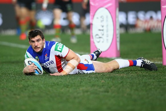 False hope: Kade Snowden scores a try for the Knights in the third minute of the match.
