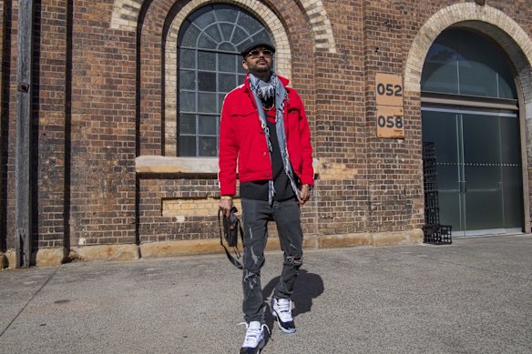 Sean Haque wearing a Fear of God jacket  and Diesel jeans.