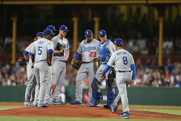 Dodgers send their $34m pitcher Clayton Kershaw back to the dugout.