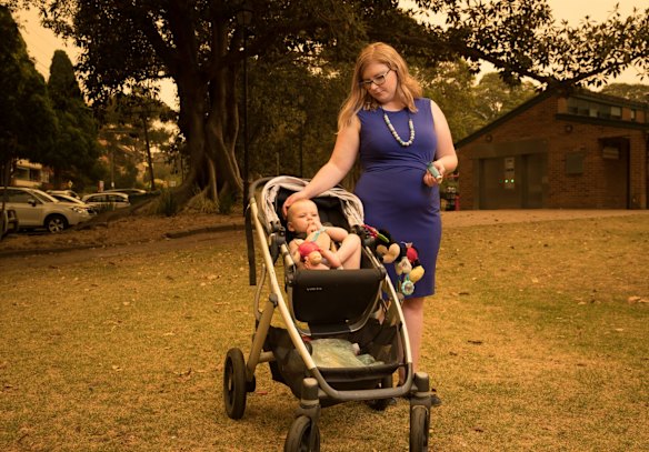 Louise Burke with her daughter, Isabella, is an asthma sufferer and has been struggling through these weeks of bush fire smoke in Sydney.