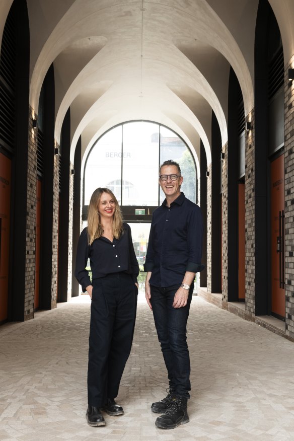 SJB architects Emily Wombwell with Adam Haddow. Haddow says the vaulted entrance really lets visitors know they have arrived.