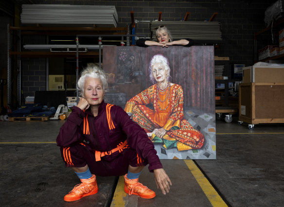 Artist Robyn Ross (right) with sitter Sarah Jane Adams and her Archibald entry.