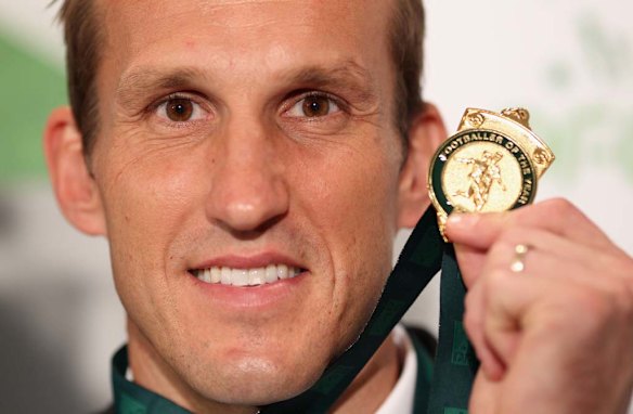 Mark Schwarzer of the Socceroos poses with his Footballer of the Year Award in 2010.