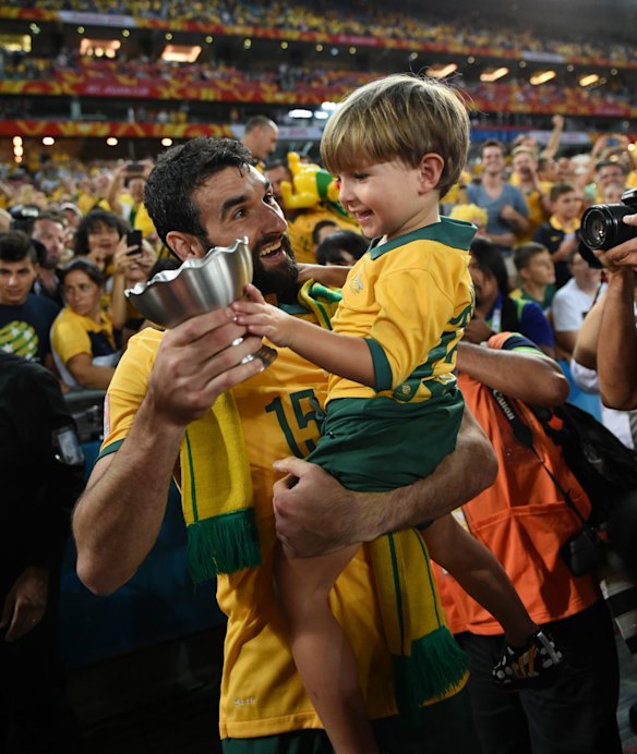 Mile Jedinak celebrates
