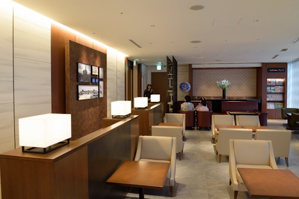People sit in the View Gold Lounge, operated by East Japan Railway Company and View Card, at Tokyo Station in Tokyo, Japan. Starting Saturday 26 March 2016, Japan's bullet train Shinkansen rolls into the county's second-largest island Hokkaido for the first time. Passengers on the GranClass can check into this lounge at Tokyo Station before boarding. 