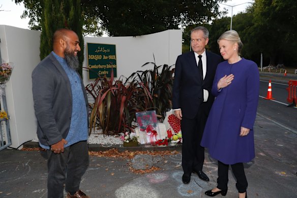 Australian opposition leader Bill Shorten and his wife Chloe Shorten meet mosque member Naseem outside the Al-Noor Mosque in Christchurch.