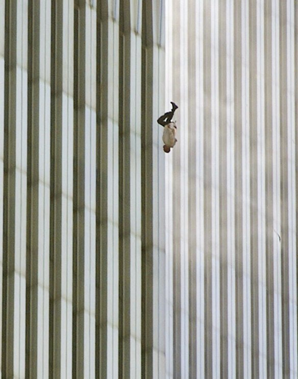 In this Tuesday, Sept. 11, 2001 picture, a person falls headfirst from the north tower of New York's World Trade Center.