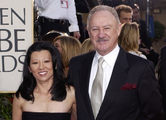 Gene Hackman arrives with his wife, Betsy Arakawa, for the 60th Annual Golden Globe Awards in 2003.