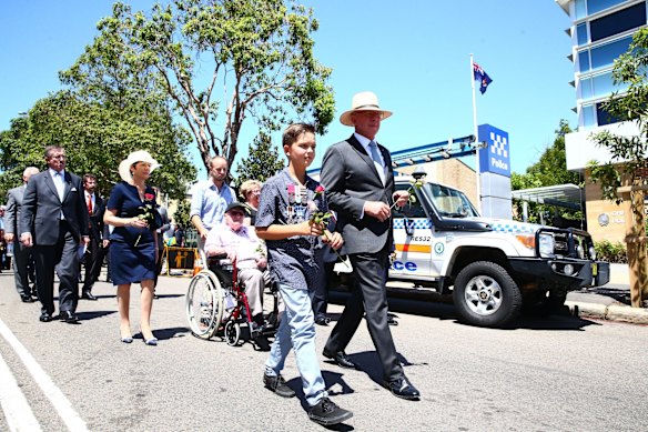 Family and friends make their way to the service.