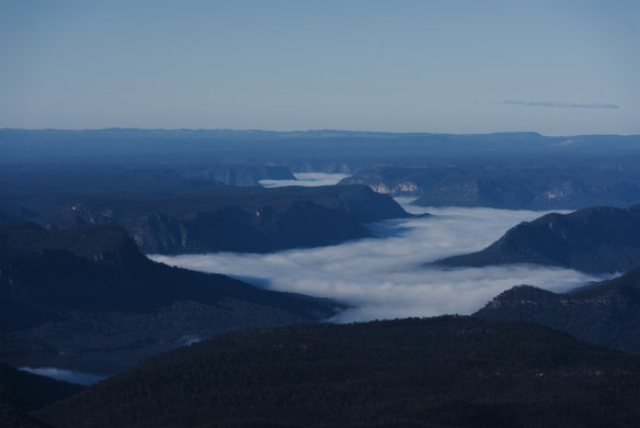 Lake Burragorang, which sits behind Warragamba dam, shrouded in cloud early in the spring.