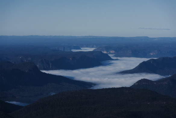 Lake Burragorang, which sits behind Warragamba dam, shrouded in cloud early in the spring.