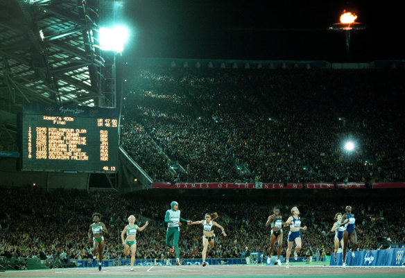 Cathy Freeman wins gold in the 400 metres in Sydney. 