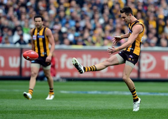 Jack Gunston kicks the Hawks first goal.