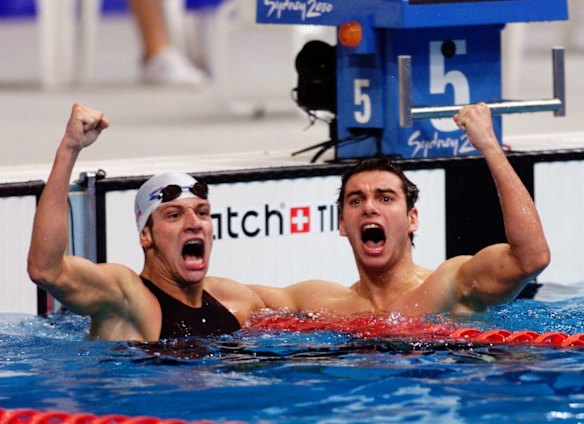 Winner of the men's 200m breaststroke final Domenico Fioravanti of Italy, left, celebrates with teammate Davide Rummolo, who came third. 