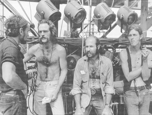 Lighting designer Chip Monck (2nd left).