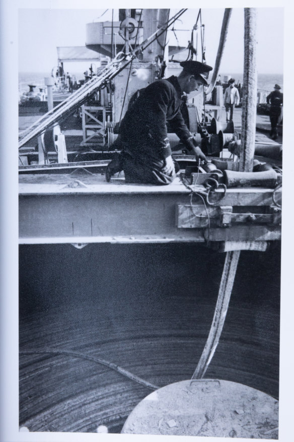 Lieutenant Lyle Miller in HMS Sandcroft, laying a refuelling cable for ships following D-Day in June 1944.