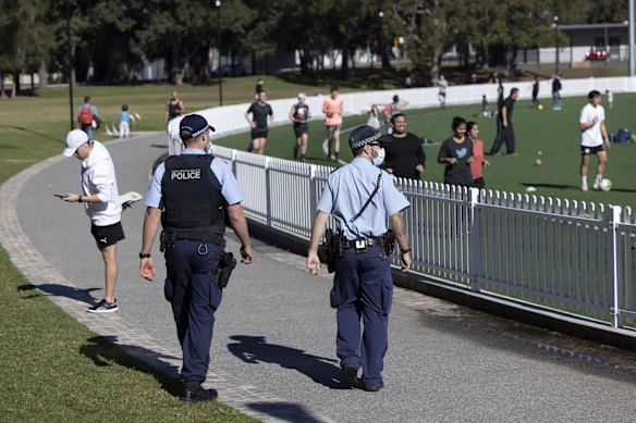 Police patrol Gore Hill Oval in St Leonards on Saturday, July 3.