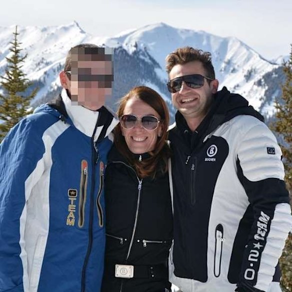 Anthony Koletti and Melissa Caddick and her son with blurred features skiing.