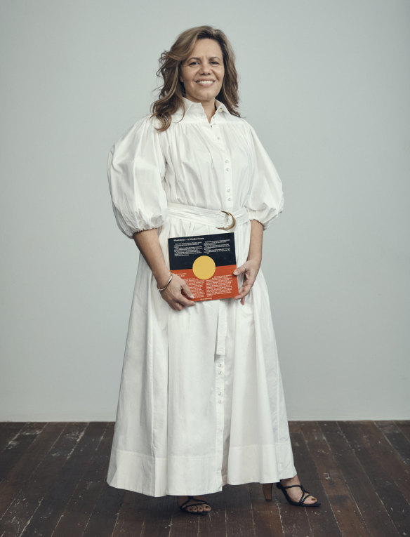 Weldon holds her Great Aunt's 1986 book 'Windradyne - A Wiradjuri Koorie' as part of a new portrait series. 