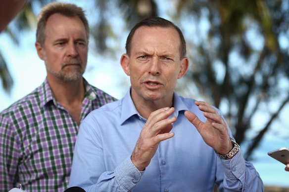 Prime Minister Tony Abbott addresses the media during a joint press conference with Indigenous Affairs Minister Nigel Scullion at the Seisia foreshore during their visit to Cape York, on Friday 28 August 2015.