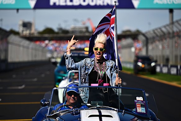 Australian DJ Miriam Nervo enjoys the atmosphere on the drivers parade