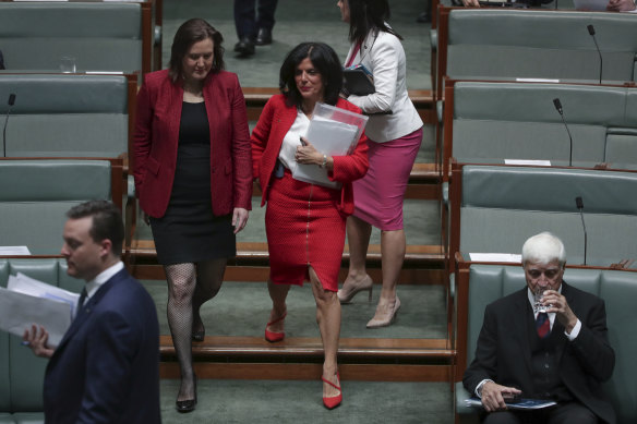 Women in red: Kelly O'Dwyer and Julia Banks in parliament.