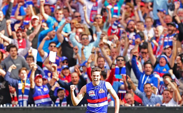 MELBOURNE, AUSTRALIA - OCTOBER 01: Zaine Cordy of the Bulldogs celebrates after kicking a goal during the 2016 Toyota AFL Grand Final match between the Sydney Swans and the Western Bulldogs at the Melbourne Cricket Ground on October 1, 2016 in Melbourne, Australia. (Photo by Scott Barbour/Fairfax Media)