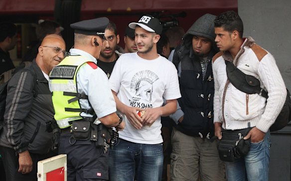 Migrants arrive from Austria at Munich Hauptbahnhof main railway station in Munich, Germany.
