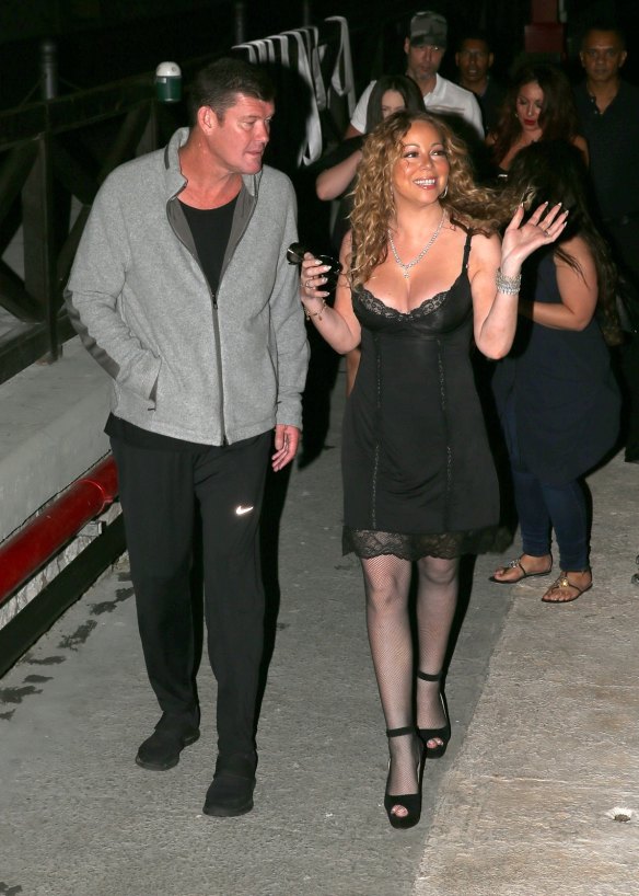 James Packer and Mariah Carey walk the streets of Capri on Wednesday night. 