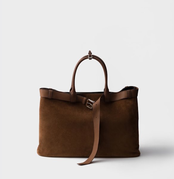 Burke is coveting a new bag, possibly this one by Prada.