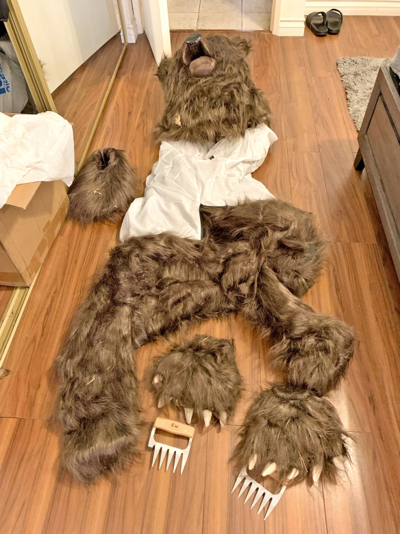 A photo provided by the California Department of Insurance shows a bear costume found in the home of a suspect in an insurance fraud case. 