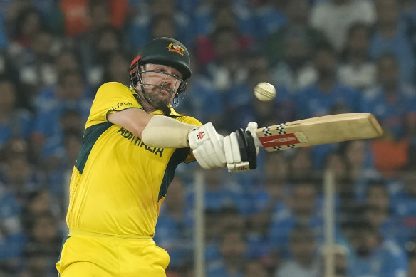 What a knock: Travis Head has guided Australia to a sixth World Cup.