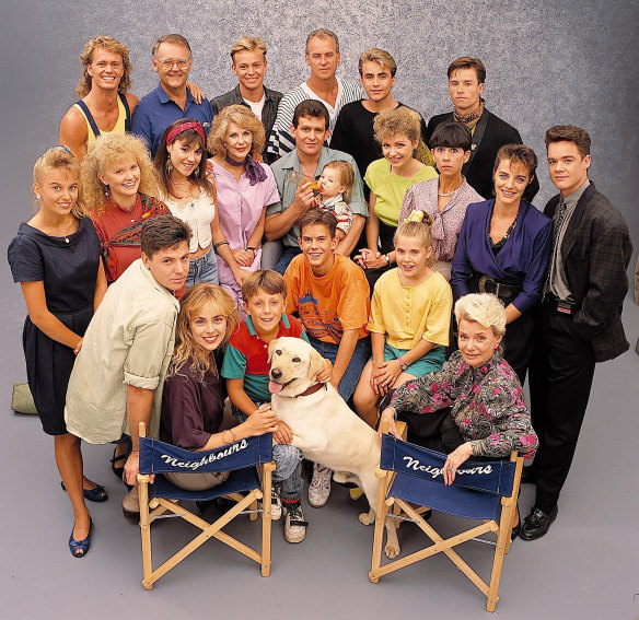 The cast of Neighbours in 1989, including Stefan Dennis (far right), and Guy Pearce (back right).