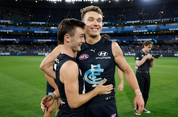Now and the future: Jagga Smith and Patrick Cripps celebrate after the Blues’ win over Richmond in round one.