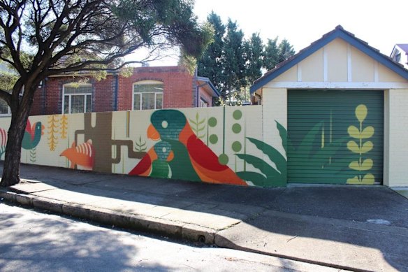 Artwork by Geebs in progress. Marrickville Council is pairing street artists with homeowners to make giant murals on their walls and deter graffiti artists.