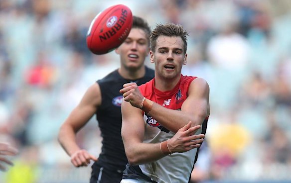 Dom Tyson fires out a handball.