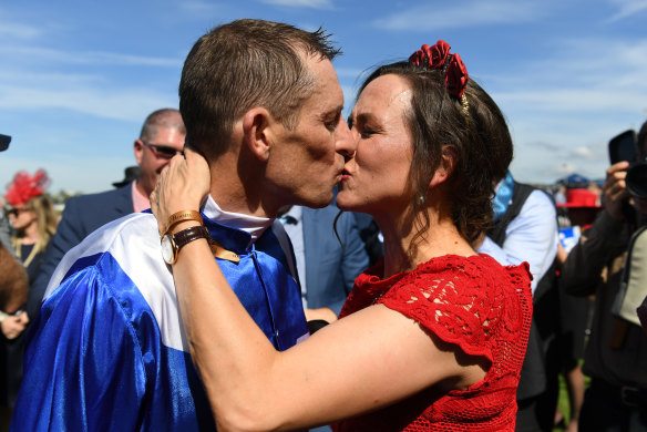 Great match: Hugh Bowman kisses his wife Christine after his winning ride aboard Winx in the George Ryder Stakes. 